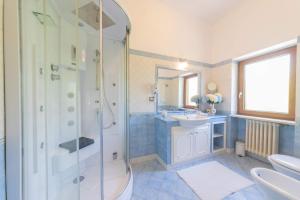 a bathroom with a shower and a sink at Cerasella B&B in Ischia
