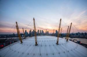 a group of towers on top of a building with a city at Lovely 2Bedroom Apartment at O2 London 01 in London