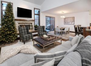 a living room with a christmas tree and a couch at Wildflower Place Unit 5 in Edwards