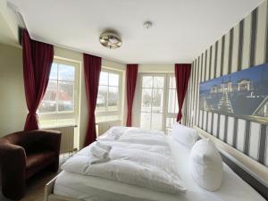 Fotografie z fotogalerie ubytování Seepark Sellin - Haus Südperd Ferienwohnung 721 Südostbalkon v destinaci Ostseebad Sellin