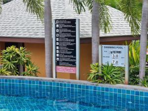 Bazén v ubytování Laguna beach condo resort 3 maldives pattaya pool view ลากูน่า บีช คอนโด รีสอร์ต 3 พัทยา nebo v jeho okolí