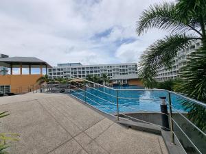 Bazén v ubytování Laguna beach condo resort 3 maldives pattaya pool view ลากูน่า บีช คอนโด รีสอร์ต 3 พัทยา nebo v jeho okolí
