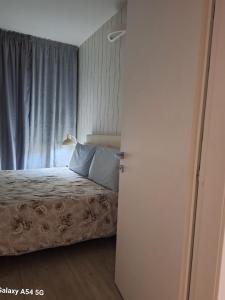 Posteľ alebo postele v izbe v ubytovaní Adam Apartment