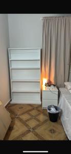 Ένα ή περισσότερα κρεβάτια σε δωμάτιο στο Golf compound