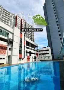 a swimming pool in front of a building at Ipoh Anderson Town Suites with 2 Parking by IWH in Ipoh