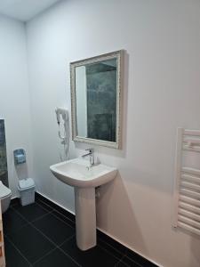 Koupelna v ubytování Hotel 3A
