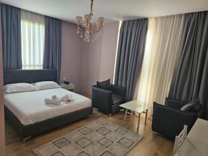 Postel nebo postele na pokoji v ubytování Hotel 3A