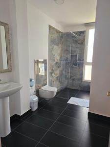 Koupelna v ubytování Hotel 3A