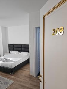 Postel nebo postele na pokoji v ubytování Hotel 3A