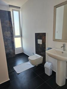 Koupelna v ubytování Hotel 3A