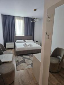 Postel nebo postele na pokoji v ubytování Hotel 3A