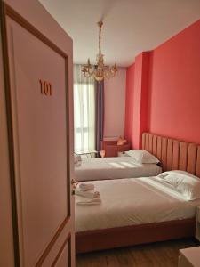Postel nebo postele na pokoji v ubytování Hotel 3A