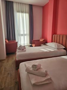 Postel nebo postele na pokoji v ubytování Hotel 3A