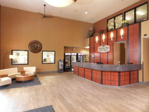 a lobby of a hospital with a waiting room at Crystal Inn Hotel & Suites - West Valley City in West Valley City