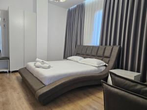Postel nebo postele na pokoji v ubytování Hotel 3A