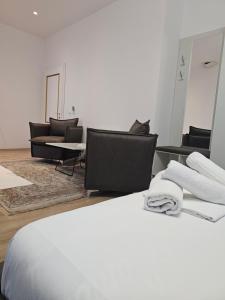 Postel nebo postele na pokoji v ubytování Hotel 3A