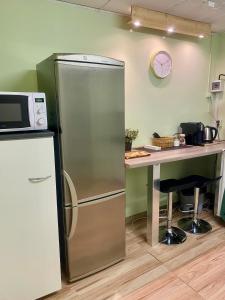 Kuchyň nebo kuchyňský kout v ubytování Henno Studio Apartment