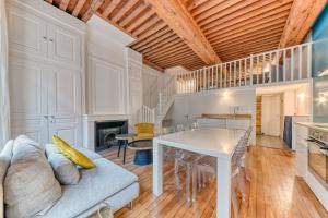 Η κουζίνα ή μικρή κουζίνα στο GuestReady - A classy stay in the heart of Lyon +17 φωτογραφίες