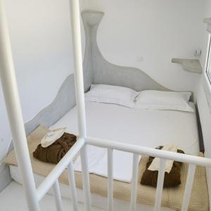 Llit o llits en una habitació de honeymoon klima suite