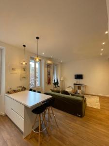 Kuchyňa alebo kuchynka v ubytovaní Appartement Design sur Vauban - Clim et Wifi