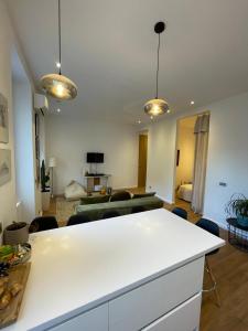 Kuchyňa alebo kuchynka v ubytovaní Appartement Design sur Vauban - Clim et Wifi