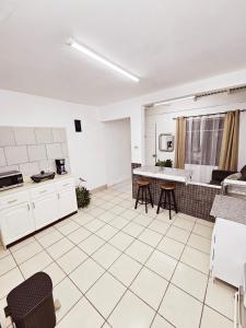 Kuchyň nebo kuchyňský kout v ubytování Apartamento SamSay II
