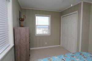 Tempat tidur dalam kamar di One More Time Again by Pristine Properties Vacation Rentals