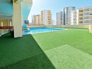Apartment Praia Rocha Sea View Summer 2の敷地内または近くにあるプール
