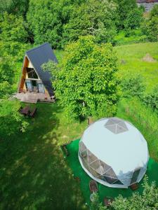 an overhead view of a tent in a field at The Frog Glamping in Horezu