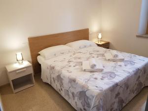 Кровать или кровати в номере Villa Montegolo