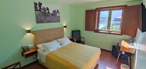 Ένα ή περισσότερα κρεβάτια σε δωμάτιο στο Hotel Casa do Tua +33 φωτογραφίες