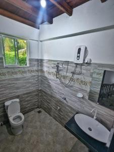 Koupelna v ubytování Nelundeniya Resort