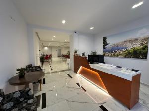 TV a/nebo společenská místnost v ubytování Relax Mea Hotel