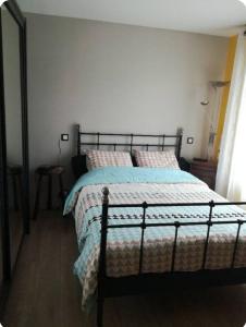 Postel nebo postele na pokoji v ubytování Maison port-en-bessin