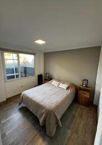 Кровать или кровати в номере Mantra