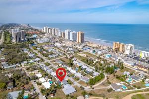 an aerial view of a city with a red marker at Walk to Beach, Heated Pool, Dog-Friendly, Firepit in Daytona Beach