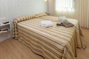 Postel nebo postele na pokoji v ubytování Apartamento Torre Gran Luxe 2