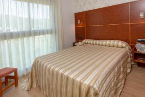 Postel nebo postele na pokoji v ubytování Apartamento Torre Gran Luxe 2