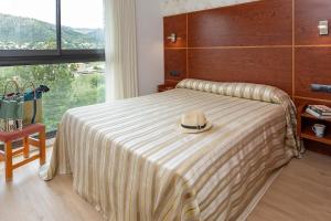 Katil atau katil-katil dalam bilik di Apartamento Torre Gran Luxe 2