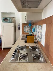 A kitchen or kitchenette at LA CONCHIGLIA - Sirolo Suite