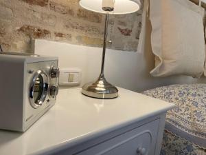A bed or beds in a room at LA CONCHIGLIA - Sirolo Suite