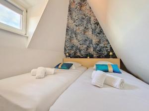 Postel nebo postele na pokoji v ubytování Loft Bariga