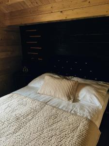 Tempat tidur dalam kamar di Parkowy Kudowa