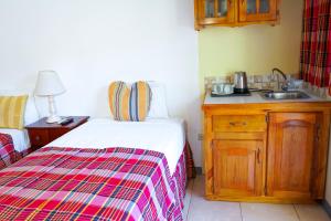 Letto o letti in una camera di AYURVEDA RESORT