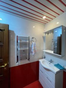 a bathroom with a sink and a mirror at Jermuk in Jermuk