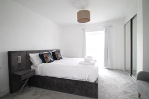 Katil atau katil-katil dalam bilik di Beaulieu Park - Sleeps 10 - Chelmsford
