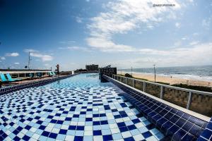 Bazén v ubytování Flat Pé na Areia, Recife-Piedade nebo v jeho okolí