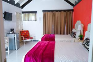 Letto o letti in una camera di AYURVEDA RESORT