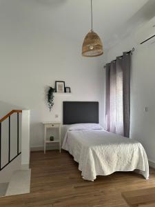 A bed or beds in a room at Villa Alicia