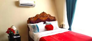 Giường trong phòng chung tại Chan Beach Resort & Hotel